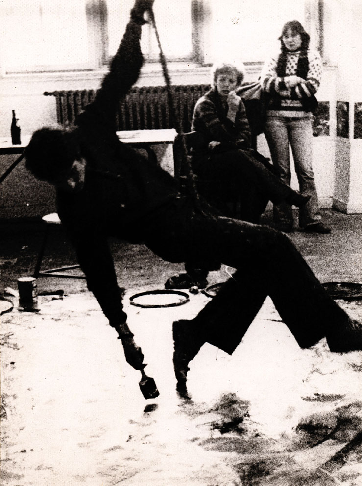 Horst Gläsker - Brush dance on carpet hanging from a rope